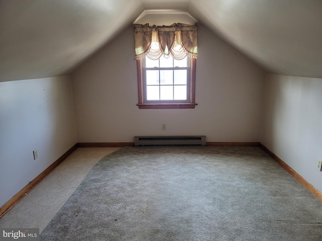 bonus room with lofted ceiling, carpet flooring, and a baseboard radiator