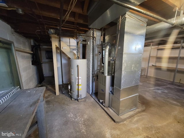 basement with water heater and heating unit