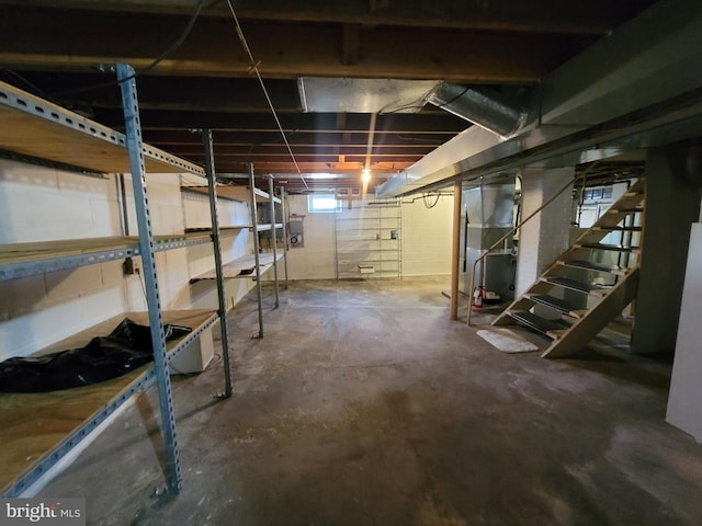 basement featuring heating unit