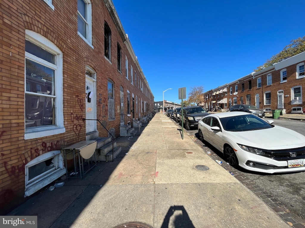view of street with street lighting and sidewalks