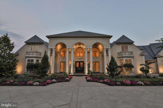 mediterranean / spanish-style house featuring french doors