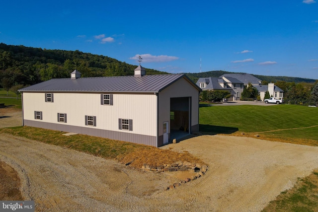 view of side of property with a garage