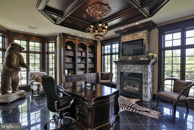 office area featuring a fireplace, a chandelier, crown molding, and coffered ceiling