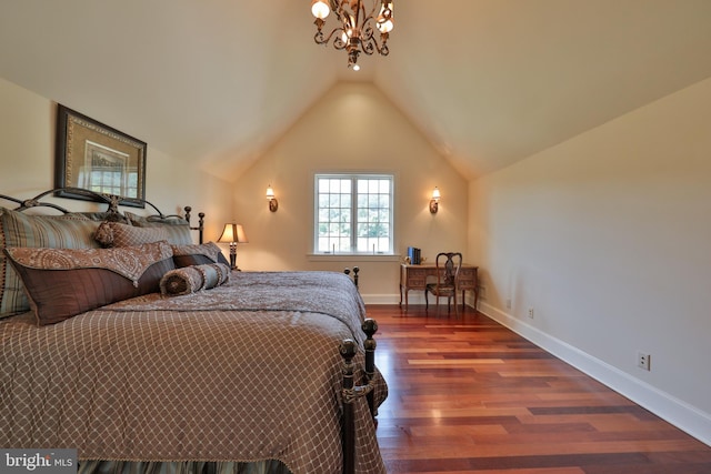 bedroom featuring hardwood / wood-style flooring and vaulted ceiling