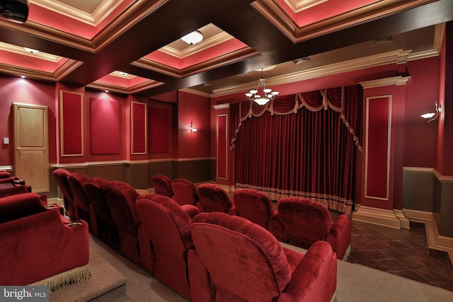 cinema room with coffered ceiling, ornamental molding, and beam ceiling