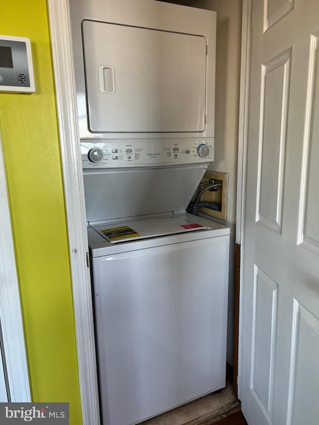 14211 Dukes Ave Unit 203, Ocean City, MD 21842 - washroom with stacked washer / drying machine