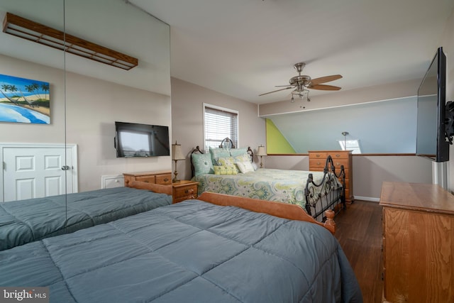 14211 Dukes Ave Unit 203, Ocean City, MD 21842 - bedroom with wood finished floors, a ceiling fan, and baseboards