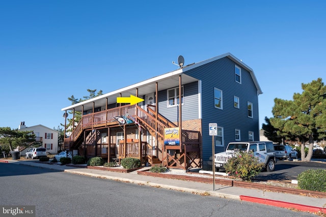 14211 Dukes Ave Unit 203, Ocean City, MD 21842 - view of property featuring stairway