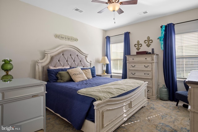 bedroom featuring ceiling fan and carpet flooring