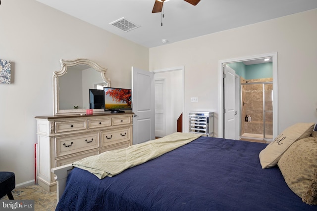 bedroom with ensuite bath and ceiling fan