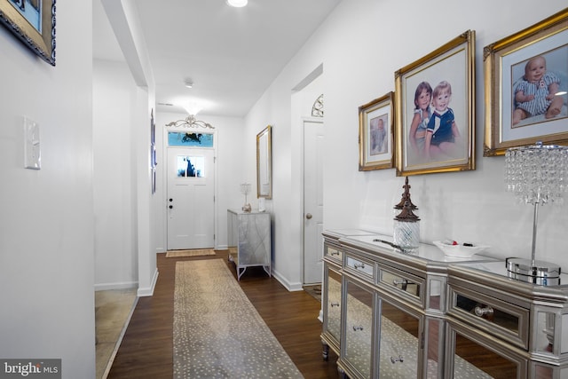 hallway featuring dark hardwood / wood-style floors