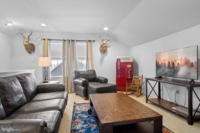 living room featuring lofted ceiling and light colored carpet