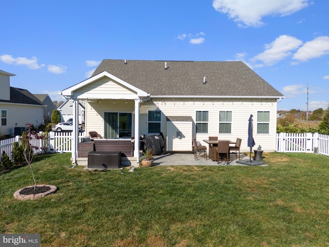 back of house with a patio, a lawn, and an outdoor hangout area