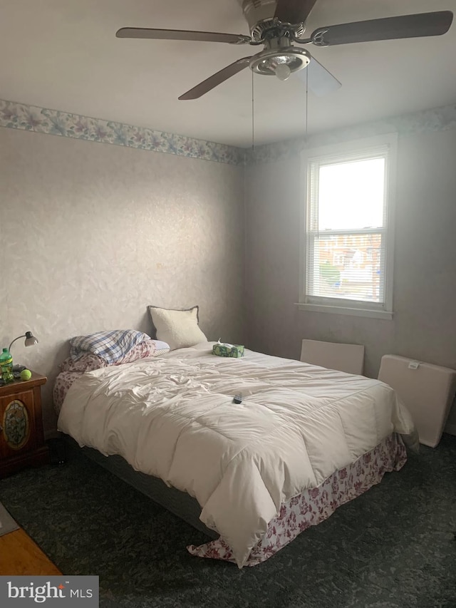 bedroom featuring ceiling fan