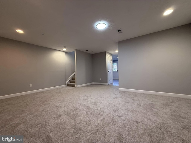 basement featuring carpet flooring