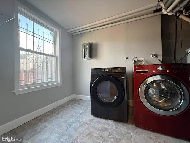 washroom with separate washer and dryer