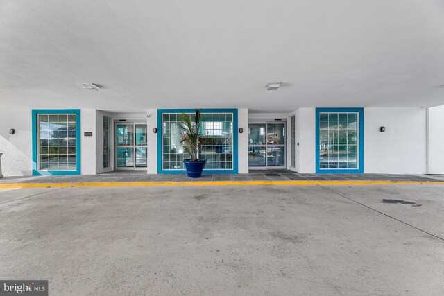 200 59th St Unit 506, Ocean City, MD 21842 - property entrance featuring stucco siding