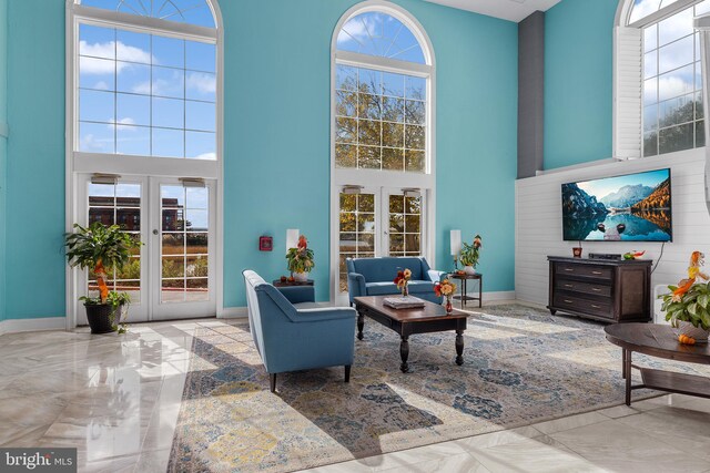 200 59th St Unit 506, Ocean City, MD 21842 - interior space with baseboards, marble finish floor, french doors, and a high ceiling