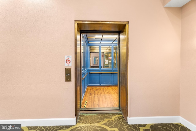 doorway to property with elevator