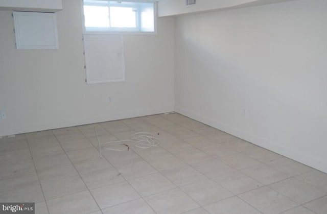 basement with light tile patterned floors