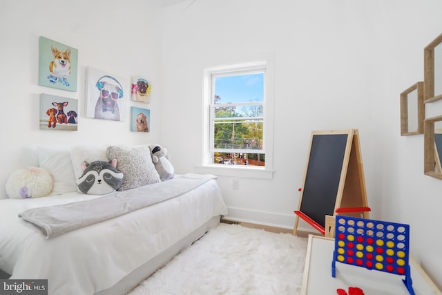 bedroom featuring light wood-type flooring