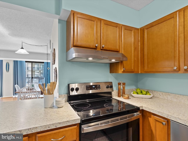 kitchen with a textured ceiling and stainless steel range with electric stovetop