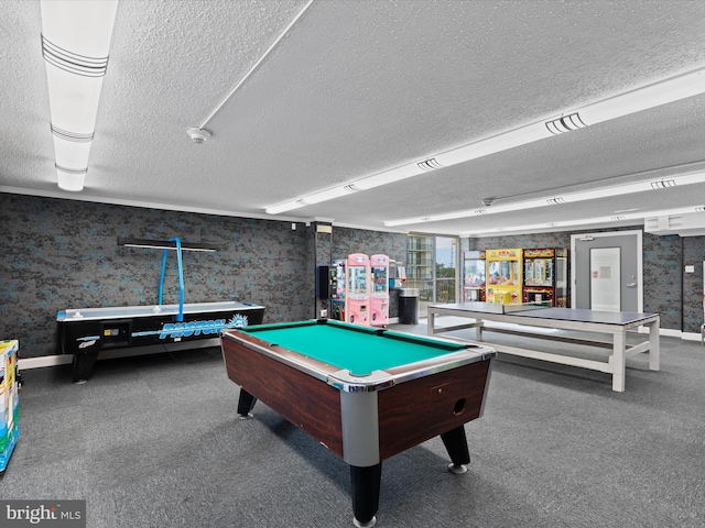 recreation room with a textured ceiling, pool table, and dark carpet