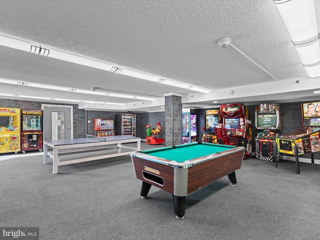 rec room with pool table, carpet, and a textured ceiling