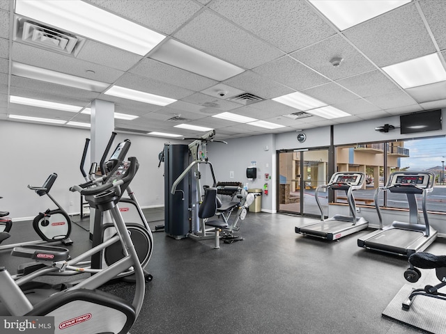 gym with a drop ceiling