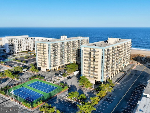 bird's eye view with a beach view and a water view