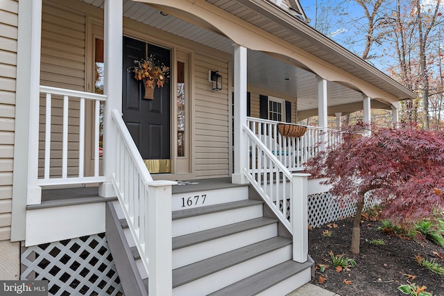 doorway to property with a porch