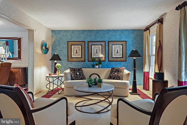 living area with light colored carpet and a textured ceiling