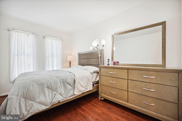 bedroom featuring dark wood-type flooring