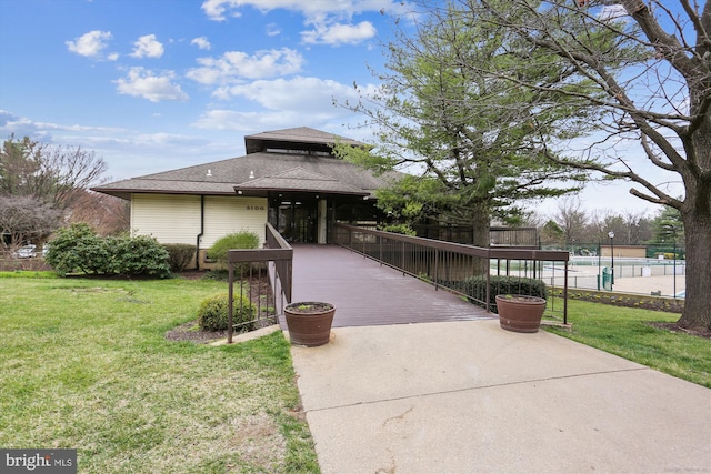 exterior space featuring a lawn