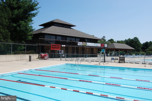 view of swimming pool featuring a patio