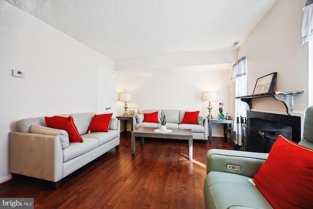 living room featuring dark hardwood / wood-style floors