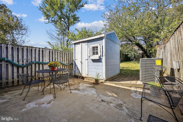 view of outbuilding featuring central AC