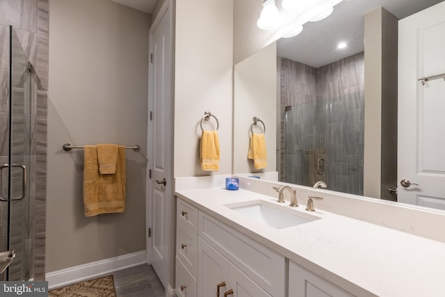 12920 Carmel Ave Unit 10, Ocean City, MD 21842 - bathroom featuring a shower stall, baseboards, vanity, and recessed lighting