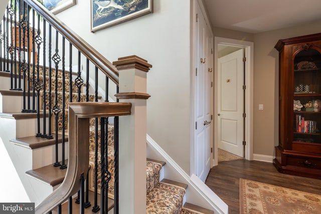 12920 Carmel Ave Unit 10, Ocean City, MD 21842 - staircase featuring wood finished floors and baseboards