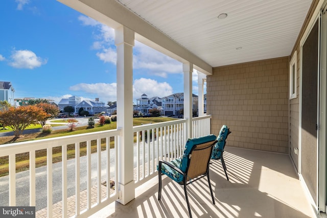 12920 Carmel Ave Unit 10, Ocean City, MD 21842 - covered porch featuring a residential view
