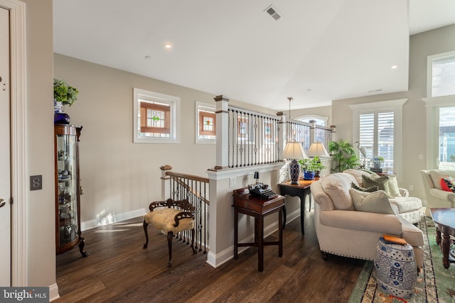 12920 Carmel Ave Unit 10, Ocean City, MD 21842 - living area featuring dark wood-style floors, vaulted ceiling, recessed lighting, and baseboards