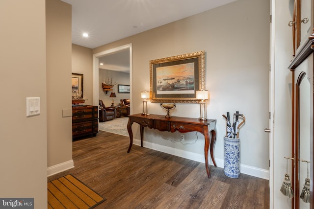 hall with dark hardwood / wood-style floors