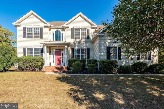 view of front facade with a front lawn