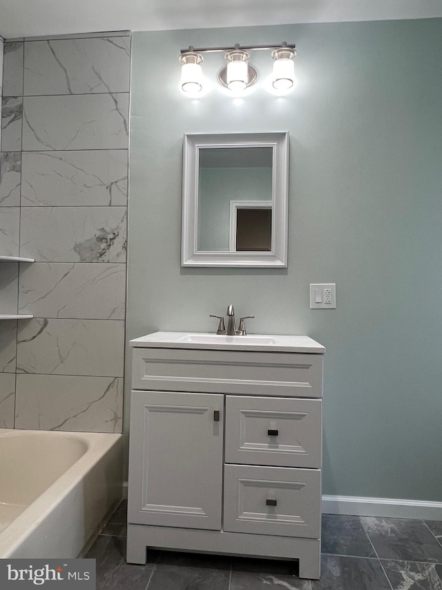 bathroom with vanity and a tub to relax in