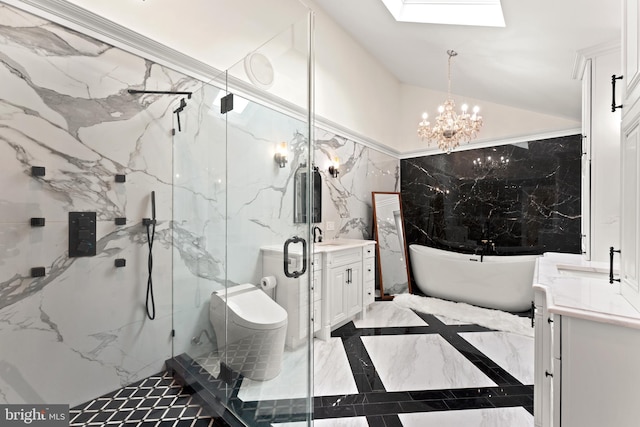 full bathroom with an inviting chandelier, a skylight, vanity, toilet, and tile walls