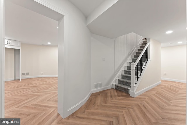 stairs with parquet flooring