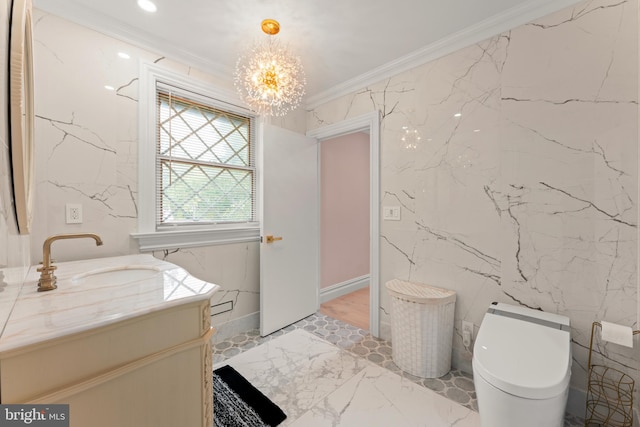 bathroom with vanity, toilet, an inviting chandelier, and crown molding