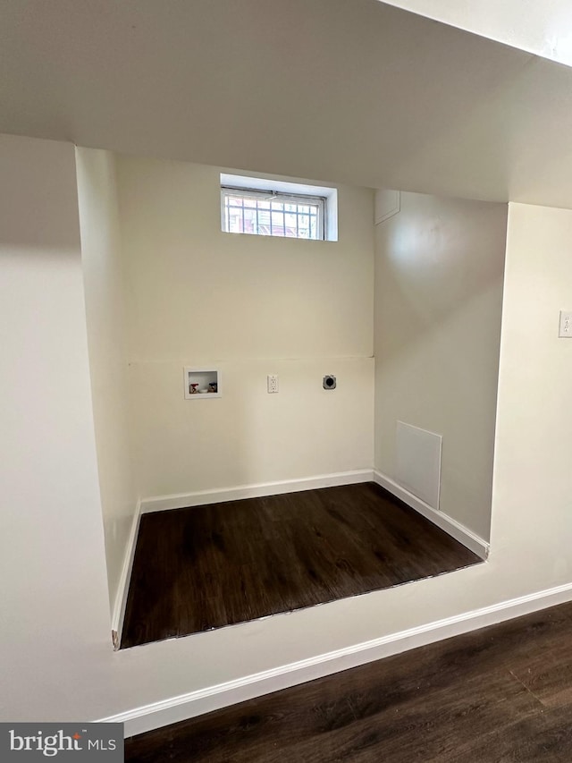 laundry room with washer hookup, hardwood / wood-style flooring, and electric dryer hookup