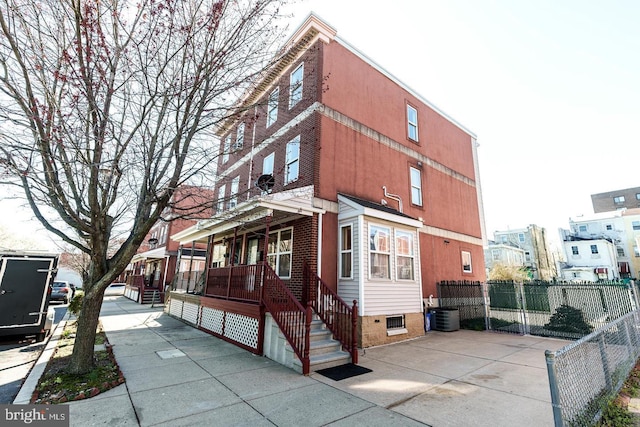 view of property exterior with central AC unit