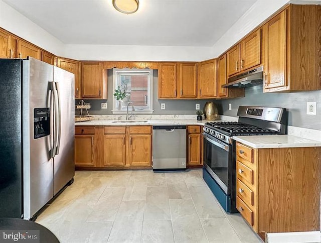 kitchen featuring appliances with stainless steel finishes and sink